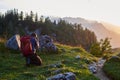 Photographer taking a picture of the sunset in the mountains of Tirol, Austria, near Gosau Royalty Free Stock Photo