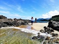 Photographer taking a picture of tropical beach in Abra de Ilog, Mindoro Royalty Free Stock Photo