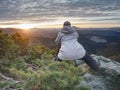 Photographer taking picture. Woman artist photo enthusiast  works Royalty Free Stock Photo