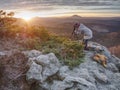 Photographer taking picture. Woman artist photo enthusiast  works Royalty Free Stock Photo