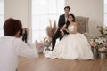 Photographer taking pictures of bride and groom in wedding ceremony, Love ,Romantic and wedding proposal concept Royalty Free Stock Photo