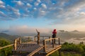 Photographer on the wooden bridge on sunrise at Phu Lam Duan view point Royalty Free Stock Photo