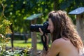 Photographer taking vineyards pictures Royalty Free Stock Photo