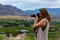 Photographer taking vineyards pictures Royalty Free Stock Photo