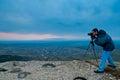 Photographer on top of mountain Royalty Free Stock Photo