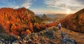 Photographer on top in mountain landscape Royalty Free Stock Photo