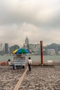 Photographer tries to sell photos of people, Kowloon, Hong Kong, China