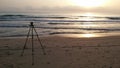 Photographer trypod facing de sunrise Royalty Free Stock Photo
