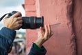 A photographer using additional devices to get effects on a photo Royalty Free Stock Photo