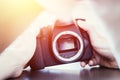 Photographer is using a professional camera, open sensor and sunlight Royalty Free Stock Photo