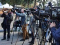 Photographer and video cameras at press conference Royalty Free Stock Photo