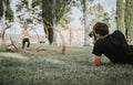 photographer or videographer working in the park