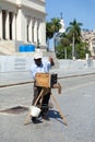 Photographer with vintage camera, Havana, Cuba