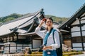 Photographer visiting Japanese traditional temple Royalty Free Stock Photo