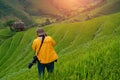 Photographer wearing a yellow suit is standing Royalty Free Stock Photo