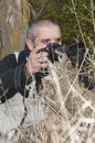 Photographer in a wild environment. Royalty Free Stock Photo