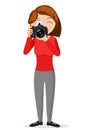 Photographer woman holding a reflex camera in her hands on a white. Character Royalty Free Stock Photo