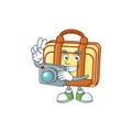 Photographer work suitcase cartoon character with mascot