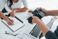 Photographer at work. Two young female freelancers indoors in the office at daytime Royalty Free Stock Photo