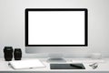 Photographer workspace with blank screen computer display and tablet for mockup on work desk with keyboard, mouse, camera lens Royalty Free Stock Photo