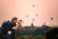 Photographer young touristman journey in Bagan Pagoda Mandalay