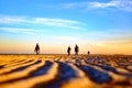 Photographers on the beach