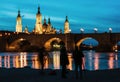 Photographers in front of Basilica del Pilar and Puente de Piedra at sunset in Zaragoza, Aragon, Spain Royalty Free Stock Photo