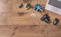 Photographers and graphic designers workplace. Flat lay top view of  desk with laptop, camera. Wooden table copy space Royalty Free Stock Photo