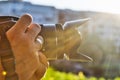 Photographers hands with camera