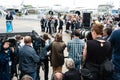 Photographers and journalists at a press conference.