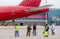 Photographers make photoes of Boeing 777-300 of Rossiya Airlines on airfield. Plane spotting, hobby, aviation Royalty Free Stock Photo