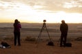 Photographers photographing a sunset