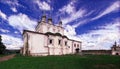 Photographic art picture of famous Goritsky orthodox monastery under blue cloudy sky in summer