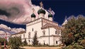 Photographic art picture of famous Goritsky orthodox monastery under blue cloudy sky in summer