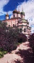 Photographic art picture of way to church concept: footpath to famous Goritsky orthodox monastery under blue cloudy sky in summer