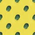 Photographic collage. Seamless pattern with Fresh Ugly triple green organic cucumber, Vegetable with unusual shape on yellow empty