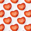 Photographic collage, seamless pattern with Isolated heart shape red strawberry cut in half on a white background. Macro Royalty Free Stock Photo