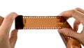 Photographic filmin hands Royalty Free Stock Photo