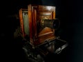 Photographic plate old 1920 camera isolated on black