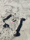 Photographic shooting at the beach. view of the start of construction of a sand castle