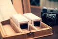 Photographic slides binder classifier and vintage camera