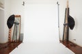 Photographic studio interior with white blank background