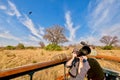 Photographing birds in flight on an African safari in northern Botswana.