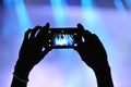 Photographing with cell phone at the concert