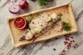 Photographing food flat lay Caucasian cuisine. Delicious Georgian dish on the table. Grilled fish. Royalty Free Stock Photo