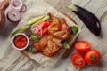 Photographing food flat lay Caucasian cuisine. Delicious Georgian tobacco chicken on the table. Royalty Free Stock Photo