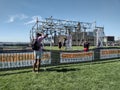 Photographing A Sporting Event, Photographer At An Obstacle Course Race, Hoboken, NJ, USA