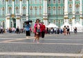 Photographing tourists at the Palace square