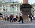 Photographing tourists at the Palace square