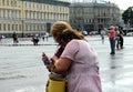 Photographing tourists at the Palace square